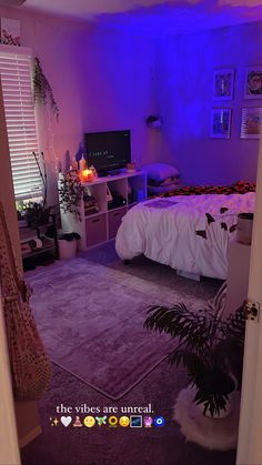 the bedroom is lit up with purple lighting