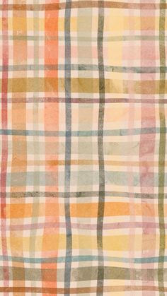 an orange, yellow and green plaid pattern on fabric