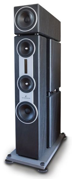 a pair of speakers sitting on top of a metal stand in front of a white background