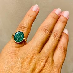 Elegant chevalier and not only ring made of 14 carats of yellow gold with a carved green onyx engraved with an olive branch. Green onyx is the symbol of relaxation and purity. It is believed to provide positive sentiment, strong mental support. Onyx dimensions: 13.0 * 11.0 mm. / 0.51 * 0.43 inch. Ring size: 49.0 FR / 5.0 US. This ring is available at any size, upon request.  14k solid gold signet ring with a beautiful oval-shaped mineral green onyx, custom made in MELIGreece's workshop in Athens.  The olive branch is a peace or a victory symbol derived from the traditions of ancient Greece, and the assumption that the gods and the people in power, and is in most cultures of the Mediterranean basin. This engraved gold ring is accompanied by an elegant jewelry box and gift packaging. Match i Green Oval Cabochon Signet Ring As Gift, Green Oval Cabochon Signet Ring For Gift, Green 14k Stamped Signet Ring As Gift, Green 14k Stamped Signet Ring, Perfect For Gifts, Gift Green Signet Ring Stamped 14k, Gift Green 14k Stamped Signet Ring, Green 14k Gold Hallmarked Signet Ring, Olive Branch Design, Rose Gold Chain Necklace