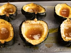 eggplant stuffed with cheese and sauce on a baking sheet ready to go into the oven