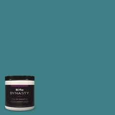 a can of dymasty paint on a gray background