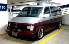 the van is parked in the parking garage