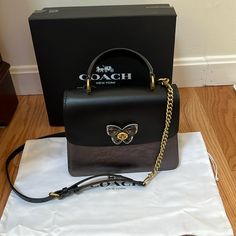 Nwt! Coach Top Handle Butterfly Turn Lock Crossbody With Snakeskin Side Detail. Black With Pewter, Sold Out. Comes With Dust Bag And Box Which Is A Little Broken. Coach Bags, Snake Skin, Top Handle, Black Gray, Dust Bag, Black And Grey, Bag Lady, Turn Ons, Women Shopping