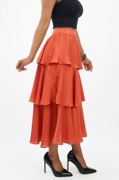 Indulge in luxe sophistication with our Layered Satin Midi Skirt. The cascading layers of satin exude a graceful flow, making this skirt a must-have for those seeking refined elegance that effortlessly transitions from day to evening occasions. Additional Information Style: Chic, Elegant, Semi-Formal Features: Layering Occasion: Casual, Cocktail/Party, Date Night, Wedding, Work Wear Length: Midi Pattern: Solid Material & Care Sheer: No, lined Stretch: Non-stretch Composition: 100% Polyester Care Cascading Layers, Casual Cocktail Party, Night Wedding, Satin Midi Skirt, Flannel Jacket, Curvy Dress, Style Chic, Mini Dress Party, Semi Formal