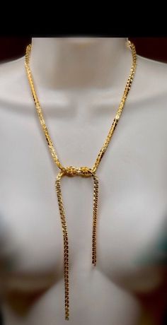 "I designed this special necklace for Stassi, spring 2022. The design is 100% her...shimmery gold with an etching on each squared link in the shape of a shooting star design which gives it all that shimmer. The wrap of this chunky chain is also unique to her style. The wrap in the middle is soldered and cannot be undone. There are two neck sizes available and Stassi has both. A 14\" inch which lays at the base of the neck, and comes with a 2\" inch extension chain or an 18\" inch with a 2\" inch Gold Necklaces With Square Pendant For Formal Occasions, Gold Necklace With Square Pendant For Formal Occasions, Adjustable Hammered Gold Jewelry, Gold Metal Box Chain Necklace, Luxury Gold Lariat Necklace For Anniversary, Gold Plated Lariat Necklace, Tarnish Resistant, Gold-plated Tarnish-resistant Lariat Necklace, Gold Rectangular Metal Chain Necklace, Gold Square Pendant Jewelry For Formal Occasions