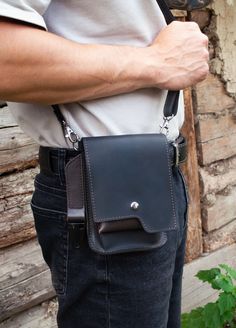 This Real Leather small men's waist bag with hook is a high-quality and durable accessory that will elevate your style. It is made from the best materials to ensure its longevity. The thick and durable genuine leather, along with steel rivets and strong threads, make this bag sturdy and long-lasting.  With a size of  W - 12 cm (4.7'),  D - 6 cm (2.3'),   H - 16 cm (6.3'),  The leather of the bag has a vintage-style turquoise finish, which gives it a unique and stylish look. Treated with wax, it has a warm and pleasant touch, and its smooth matte texture ages beautifully. Over time, the leather develops a darker patina with wear, creating a personalized and distinguished appearance. Any scratches or imperfections can be easily polished with your finger or a cloth to restore its solid color. Small Belt Bag, Mens Waist Bag, Mens Crossbody Bag, Leather Hip Bag, Small Belt, Matte Texture, Aging Beautifully, Leather Gifts, Leather Bags Handmade