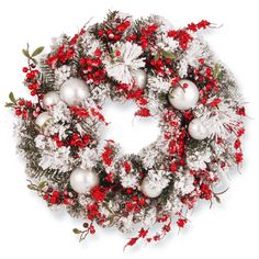 a christmas wreath with red berries and white balls on it, surrounded by snowflakes