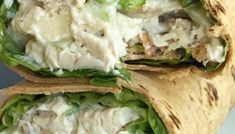 two wraps filled with chicken salad and lettuce on top of each other,