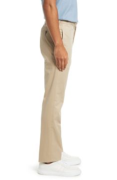 Crisp and classic, these flat-front khakis made of cotton twill sport a touch of stretch that moves across your entire casual wardrobe. 16" leg opening; 10 3/4" front rise 97% cotton, 3% spandex Machine wash, tumble dry Imported Fitted Cotton Cargo Pants With Straight Hem, Relaxed Fit Chinos In Chino Cotton Twill, Relaxed Fit Chinos In Cotton Twill, Straight Cotton Cargo Pants, Classic Chino Cotton Twill Bottoms, Spring Chino Cotton Twill Work Pants For Business Casual, Spring Chino Cotton Twill Business Casual Pants, Business Casual Solid Cotton Cargo Pants, Spring Business Casual Chino Twill Pants