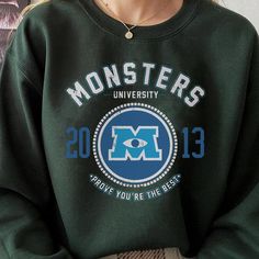 You're viewing the Disney Monsters University Collegiate Logo Shirt.
Disney Monsters University Collegiate Logo Shirt Details
Discover our high-quality Disney Monsters University Collegiate Logo Shirt with impeccable designs, available in a spectrum of colors and sizes, as well as various types of shirts. Our unique designs on men's and women's t-shirts offer a blend of humor, vintage, and retro styles. Perfect for travel, daily wear, parties, weekends, the beach, sports, or as unique gifts for Epcot Shirts, Disney Monsters, Monsters University, Retro Styles, Monster University, Beach Sports, Logo Shirt, Women's T Shirts, The Spirit