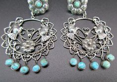 "DESCRIPTION: Even though these are considered a Oaxaca \"Wedding\" earring,wedding bells don't have to be ringing for you to wear these very feminine style earrings! You can wear these on your special day or make any day special with these Doves are praised in Oaxaca & it's where the dove is highly admired & always seems to gives off a feminine feeling of serenity, when worn..They have a wonderful Mexican Folk Art sophistication...Wear these with any Mexican textile wardrobe to your fav Turquoise Wedding Jewelry For Pierced Ears, Oaxaca Wedding, Mexican Textiles, Wedding Earring, Earring Wedding, The Dove, Santa Fe Nm, Filigree Earrings, Mexican Folk Art