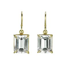 18 Karat Yellow Gold Earrings with Emerald Cut White Topaz Drops in Prong Frame Setting. Stone measures 10mm x 8mm. Earring measures 7/8" from the top of the ear wire. Formal White Topaz Earrings With Prong Setting, Formal Octagon Earrings With Prong Setting, Formal Octagon Prong Set Earrings, Classic Octagon Gemstone Earrings, Classic White Topaz Earrings For Formal Occasions, Emerald Cut Earrings, Cut Earrings, Yellow Gold Earrings, Yellow Gold Earring