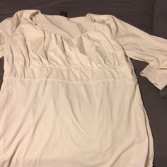 Women's White 3/4 Shirt. Worn And Washed; Not A Brand New White Color. Size Large. Fitted Cotton Tops With 3/4 Sleeves, Fitted Beige Half Sleeve Tops, White Stretch Top With 3/4 Sleeve, White Fitted Top With 3/4 Sleeves, Relaxed Fit Tops With 3/4 Sleeve For Daywear, Relaxed Fit 3/4 Sleeve Tops For Daywear, Cream 3/4 Sleeve Tops For Spring, White Relaxed Fit Shirt With 3/4 Sleeves, White Half Sleeve Top For Daywear