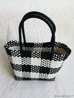 BagForLove - Versatile Plaid Square Tote Bag: Perfect for Casual Outings, Beach Vacations, and Shopping Product Description Color Black Type Straw Bag Strap Type Double Handle Pattern Type Plaid Features High-capacity Closure Type No-closure Composition 100% Polyvinyl Chloride Material PE Size Chart INCH CM Handle Height 7.1 inch Handle Height 18 cm Details Pictures Similar Products h2 { text-align: center; } /* æ¢è¡ */ li{ white-space: normal; word-break: break-all; word-wrap: break-word; } .red-box { width: 100%; display: flex; flex-direction: row; flex-wrap: wrap; justify-content: center; } .red-box > div { width: 190px; height: 250px; margin: 10px; } .red-box > div > a > img { width: 190px; height: 250px; } .size-box { width: 100%; margin: auto; white-space: nowrap; } .table { border Black Basket Bag With Large Capacity, Black Large Capacity Basket Bag, Black Large Capacity Basket Shoulder Bag, Black Basket Shoulder Bag With Large Capacity, Black Woven Handheld Shoulder Bag, Large Capacity Black Basket Shoulder Bag, Casual White Square Beach Bag, Black Large Capacity Straw Bag For Beach Season, Black Summer Straw Bag For Shopping