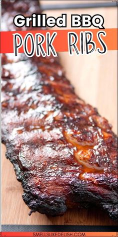 grilled bbq pork ribs on a cutting board with text overlay that reads grilled bbq pork ribs