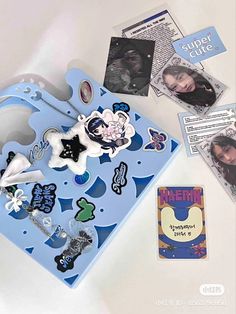 an assortment of items are displayed on a white surface with tags and stickers attached to them