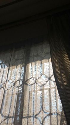 the curtains are closed in front of the window