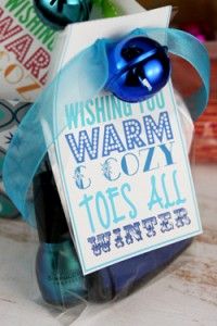 an image of a gift wrapped in blue ribbon and with the words, great gift idea only socks and a nail polish, but so cute