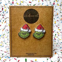 ** Please read entire listing for a better shopping experience *Grinch Earrings    -Available in stud or dangle styles.   -Dangles are made with gold hooks but silver is available upon request.  Sealed with resin for a hard, shiny finish.  Waterproof and water resistant!    Earring posts are made from stainless steel and are nickel, lead, and cadmium free. So they are perfect for sensitive ears. **Current production time is 5 business days.   If you need your order faster than that, please purch Adjustable Earrings As A Christmas Gift, Adjustable Earrings For Christmas Gift, Grinch Earrings, The Grinch Stole Christmas, Gold Hooks, Grinch Stole Christmas, The Grinch, Earring Posts, Order Up