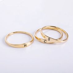 Dainty Initial Ring 14K 18K Real Gold, Personalized Skinny Letter Ring, Custom Name Engraved Mother Stacking Ring Best Friend Gift for Mom ✅Gold Material: Solid Gold (no gold-filled or no gold plated material) ✅Gold Karat: 14K (%58,5) or 18K (%75) ✅Available gold color: Yellow Gold, Rose Gold, and White Gold 📐DIMENSIONS Width of the ring: 3 mm Band width: 1.30 mm This is a handmade product so dimensions may vary. ✈️ SHIPMENT After your confirmation, I will ship your order in 1-3 business days. Estimated delivery time for UPS Express 3-4 business days. Please check your messages after your order for confirmation.  More for Initial & Name Ring  https://etsy.me/3rU1ccc Gold Sterling Silver Initial Stackable Ring, Gold Sterling Silver Stackable Initial Ring, Gold Sterling Silver Stackable Rings With Initials, Gold Sterling Silver Ring With Hallmarks, 14k Gold Stackable Rings With Initials For Anniversary, Personalized Gold Stackable Rings Fine Jewelry, Personalized Gold Stackable Fine Jewelry Rings, Elegant Stackable Rings With Initials, Elegant Stackable Wedding Rings With Initials