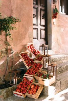 several boxes of strawberries are on the steps