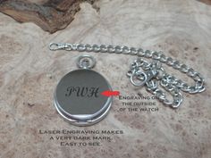 "These pocket watches take you back to the old charm for Groomsman gifts. The pewter finished hinged pocket watch on a 12\" chain can be engraved on the inside AND outside of the lid. We engrave the watch using laser engraving. Using a special technique, the engraving comes out in a dark color which is easily visible on the watch. Each of the watches come in a gift box. This listing is for the watch only. It does not include the wood piece it is photographed on. If you have any questions regardi Engraved Round Pocket Watch Collectible, Classic Silver Engraved Pocket Watch, Anniversary Engraved Silver Pocket Watch, Engraved Compact Pocket Watch As Gift, Engraved Silver Pocket Watch For Gift, Personalized Golf Gifts, Dark Mark, Ball Markers, Pocket Watches