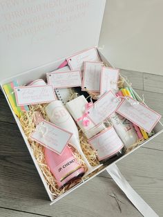 a white box filled with lots of different types of personal care items and labels on it