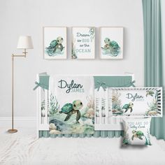 a baby crib bedding set with sea turtle prints