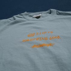 Express your faith with our "God is Up to Something Good Always" shirt. Crafted from soft, high-quality fabric, this shirt features an inspiring message that reminds you of God's continuous work in your life. The design combines comfort with a positive affirmation, making it a perfect choice for daily wear or as a meaningful gift. Embrace the promise of God's goodness and carry this uplifting message with you wherever you go. Fit: Relaxed Fit. The tee runs true to size. Fabric: 100% Cotton 6.1 o Green Cotton T-shirt With Lettering, Green Relaxed Fit Top With Lettering, Green Graphic Tee With Lettering, Green Top With Lettering And Relaxed Fit, Green Top With Lettering In Relaxed Fit, Christ Is King, Praise Jesus, Clothing Board, Firm Foundation