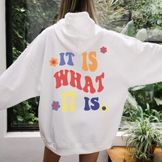 Daily Positivity: It Is What It Is ★ HOW TO ORDER ★ 1. Select the type: Hoodie or Sweatshirt 2. Select the size 3. Select the quantity 4. Add to cart ★ HOODIE & SWEATSHIRT DETAILS ★ * 50% Cotton 50% Polyester * Classic fit - runs true to size * Made-to-order * Digitally printed design (DTG) Slight color variations may occur due to the dyeing process Order a size or two up for an oversized tee fit Shop exclusive designs made by She's Gold Co. Lifestyle brand that aspires to empower and inspire wo White Hoodie With Lettering In Relaxed Fit, Casual White Hoodie With Lettering, White Hoodie With Screen Print, Retro Graphic Print Hoodie Sweatshirt, White Text Print Hoodie Tops, White Screen Print Hoodie, White Retro Hooded Sweatshirt, White Hooded Top With Screen Print, Retro White Hoodie With Graphic Print