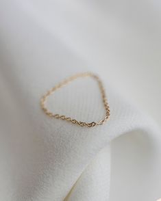 Barely there ring in 14k Gold Modern and timeless Super Dainty Link Chain Ring Perfect as a stacking ring or by itself. # Statement rings chain ring thick chain gold chain rings statment ring cuban link chain 14K gold everyday ring jewelry rings ■ SHIPPING UPGRADES You can find shipping upgrades options in the drop bar menu when you check out. * Within the U.S Regular First-class : 2-6 business days Priority : 2-3days Express : 1-2 days * International International Priority : 6-10 Business days Minimalist Gold Chain Jewelry For Anniversary, Link Chain Ring Gift, Everyday 14k Gold Rings With Adjustable Chain, Everyday Yellow Gold Adjustable Chain Ring, Yellow Gold Cable Chain Ring, Chain Link Ring As Gift, Yellow Gold Chain Link Ring With Cable Chain Detail, Classic 14k Gold Chain Ring With Adjustable Chain, Everyday Adjustable Yellow Gold Chain Ring