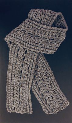 This is a unique handmade crochet scarf with an intricate pattern giving it a great dimensional look. Fashionable and very warm! Shown here in gray, but available in any color you desire. I will contact you before beginning the scarf to make sure I have exactly what you want! Also available in men's or women's sizing, just please make note of your height when ordering so that I can size it appropiately! Due to the handmade nature of each scarf, please allow 1-2 weeks for me to ship the finished product. If you need it sooner, message me and I will try my best to expedite the process and meet your deadline. Crocheted Mens Scarf, Mens Crochet Button Scarf, Men’s Crocheted Scarves, Chunky Crochet Scarf, Chunky Crochet, Handmade Gift Wrap, Men And Women, Handmade Crochet, Crochet Scarf