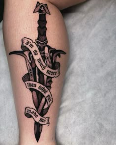 Rhapsody dagger tattoo  from Baldur’s gate 3 black and gray traditional with banner  Tattoo by @danipadrong IG Astarion Baldur's Gate Tattoo, Karlach Bg3 Tattoo, Grey Warden Tattoo, Baldurs Gate Tattoo Ideas, Matching Dagger Tattoos, Baulders Gate 3 Tattoos, Astarion Tattoo Idea, Baldurs Gate 3 Tattoo, Athame Tattoo