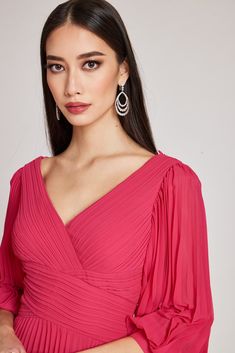 Our best selling chiffon dress now comes in a knee length version! Featuring a v-neckline and flowy puff sleeves, this unique and fashionable dress has a crossed bodice design and pleated knee length skirt. With its lightweight and delicate chiffon fabric, it is the best choice for all events. Perfect for engagement parties and rehearsal dinners. Pair with your favorite pair of metallic gold heels. Color: Fuchsia V-neckline Pleated design Puffed sleeves Knee length V-cut open back Concealed back Full Sleeve Dress, Metallic Gold Heels, Full Sleeves Dress, Fashionable Dress, Pink Wedding Dress, Engagement Parties, Color Fuchsia, Gold Heels, Puffed Sleeves