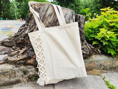 Handmade eco friendly macramé tote bag. Perfect for everyday use, shopping, beach and even gift packaging! It is made of natural material and it is suitable as a baguette bag for a bread storage Dimensions: 36 cm (14'') x 40 cm (16'') (approx.) + handle (35 cm / 14'') The bag is made of 100% cotton firm and durable fabric. The fabric bag is not sewn by me. I make macrame detail using natural off-white cotton rope. The bag is washable. You can wash it using a machine wash (gentle cycle with cold Eco-friendly Macrame Beach Bag For Daily Use, Eco-friendly Macrame Beach Bag, Eco-friendly Natural Macrame Beach Bag, Shopping Market, Baguette Bread, Bread Storage, Diy Plant Hanger, Summer Handbags, Baguette Bag