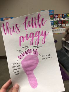 this little piggy book is written in pink and has a foot print on it