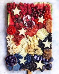 a platter filled with fruits and veggies