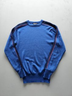 Listing: Vintage 1970s Meister Blue Acrylic Tight Knit Crewneck Sweater M Size on Tag: M Flaws: Fabric pilling Measurements: Please see the photos in the listing. If you require additional measurements or information about this item, feel free to send a message. Blue Wool Tops With Ribbed Cuffs, Fitted Blue Tops With Ribbed Cuffs, Blue Wool Knit Sweater, Fitted Blue Sweater With Ribbed Cuffs, Retro Blue Crew Neck Sweater, Blue Retro Crew Neck Sweater, Blue Fitted Wool Sweater, Fitted Blue Wool Sweater, Retro Blue Knit Sweater