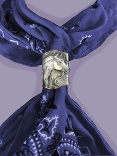 Western Scarf Slide with a Quarter Horse head set on saddle pattern background, this rolled slide is handmade in polished pewter for your Western or Western Dressage rider. Slide measures 1.25 X 1.5 inches. Designed and made by the artist, USA. Western Dressage, Western Scarf, Jamaica Outfits, Horse Scarf, Scarf Slide, Horse Western, Cowboy Aesthetic, Lesbian Fashion, Western Tack