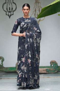 Onyx blue saree with floral applique work and floral print all over. Paired with a floral print applique work blouse. - Aza Fashions Semi-stitched Cotton Silk Pre-draped Saree With Floral Embroidery, Designer Chanderi Blouse Piece With Floral Print, Designer Chanderi Pre-draped Saree With Floral Print, Floral Print Chanderi Pre-draped Saree, Anarkali Cotton Silk Saree With Floral Embroidery, Floral Print Saree For Reception And Festivals, Blue Floral Pre-draped Saree For Festive Occasions, Unstitched Saree With Floral Print For Reception, Cotton Silk Saree With Floral Embroidery For Eid