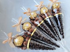 chocolate candies wrapped in cellophane and tied with ribbon