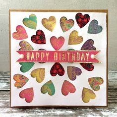 a happy birthday card with lots of hearts