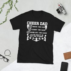 a t - shirt that says cheer dad drive the car