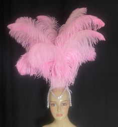 . Made in the USA and ship from the USA We make and ship our items really fast if you need it for a specific date please let us know. or call/text us at 954-3051817 to complete your order over the phone Showgirl Headdress Samba headpiece Metal Frame Headdress with prime ostrich feathers One size fits most Tall Rumba Headdress Metal frame is decorated with crystals details. Frame color is Silver chain Very easy to add on jewels and more decoration an original Neckelmanns Costumes / MiamiFeathers Costume Party Hats With Ostrich Feathers, Costume Party Hat With Ostrich Feather Trim, Ostrich Feather Trim Hat For Costume Party, Showgirl Headpiece, Showgirl Headdress, Carnival Headdress, Vegas Theme Party, Types Of Feathers, Burlesque Outfit