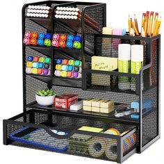 an organized desk organizer with pens, pencils and markers