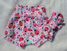 the pink ladybugs are all over this diaper and it is ready to be sewn