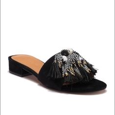 Fringed And Beaded Tassels Bring Swingy Movement To Your Every Step In A Luxe Slide Sandal Lifted Gently By A Wrapped Block Heel. Details: * Slip-On * Open Toe * Fringe & Tassel Vamp * Block Heel * Approx 1 1/4" Heel * Suede Upper, Manmade Sole * Comes In Original Box * Color: Black Elegant Open Toe Sandals With Tassels, Elegant Summer Sandals With Tassels, Chic Party Sandals With Tassels, Chic Embellished Sandals For Vacation, Elegant Beaded Round Toe Sandals, Elegant Beaded Flat Sandals, Chic Flat Embellished Sandals, Chic Beaded Open Toe Sandals, Beaded Open Toe Sandals For Evening