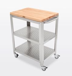 a wooden cutting board sitting on top of a metal cart