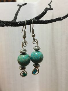 Elegant wire wrapped design  Beaded drop earring Wire Wrapped Round Bead Metal Earrings, Turquoise Beaded Earrings With Ear Wire, Turquoise Wire Wrapped Teardrop Dangle Earrings, Turquoise Wire Wrapped Beaded Earrings, Turquoise Round Beaded Earrings With Ear Wire, Handmade Turquoise Teardrop Earrings With Round Beads, Wire Wrapped Beaded Drop Earrings, Bohemian Silver-plated Drop Earrings, Bohemian Silver Plated Drop Earrings